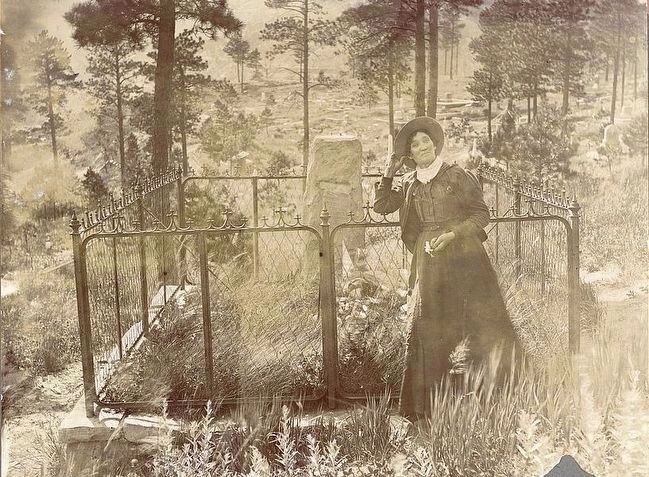 <i>Calamity Jane on Wild Bill's grave</i>. Click for full size. <i>Calamity Jane on Wild Bill's grave</i> image. Click for full size.
