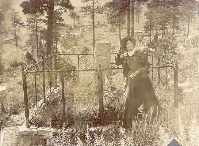 <i>Calamity Jane on Wild Bill's grave</i> image. Click for full size.