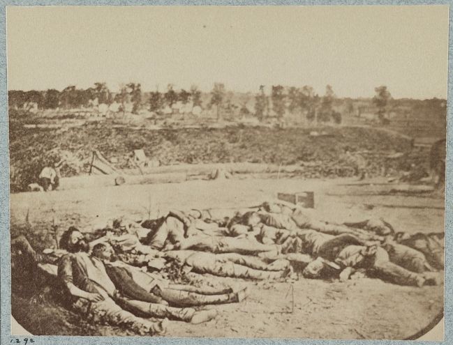Confederate dead in front of Fort Robinette, Corinth, Mississippi image. Click for full size.