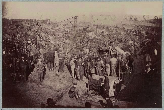 Andersonville Prison, Ga., August 17, 1864. Issuing rations, view from main gate image. Click for full size.