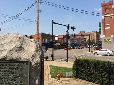 View of memorial at intersection of Main & 1st Streets. image. Click for full size.