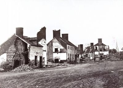 <i>Street in Fredericksburg, Va., showing houses destroyed by bombardment in December, 1862</i> image. Click for full size.