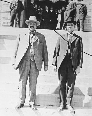 Bill Carlisle, right, and his captor Sheriff Rubie Rivera, on the steps of the Carbon County courtho image. Click for full size.
