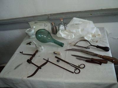 Surgeon's tools in Field Hospital image. Click for full size.