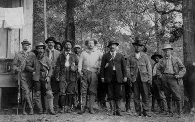 The Bear Hunters (Teddy Roosevelt in middle). Click for full size. The Bear Hunters (Teddy Roosevelt in middle) image. Click for full size.