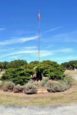 Memorial at Base of Flag Pole. Click for full size. Memorial at Base of Flag Pole image. Click for full size.