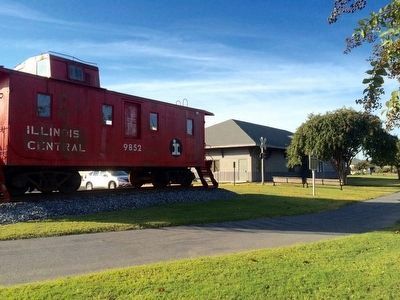 The Cleveland Depot and Illinois Central caboose.. Click for full size. The Cleveland Depot and Illinois Central caboose. image. Click for full size.