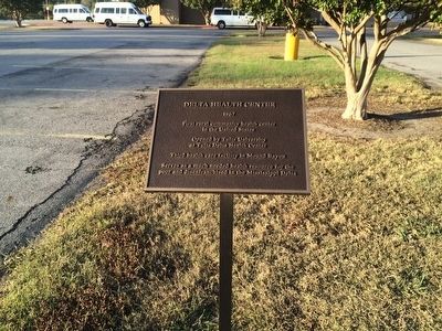 Delta Health Center plaque giving history of center.. Click for full size. Delta Health Center plaque giving history of center. image. Click for full size.