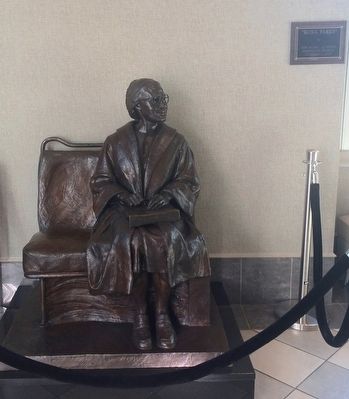 Rosa Parks statue in museum (sitting on bus seat) image. Click for full size.