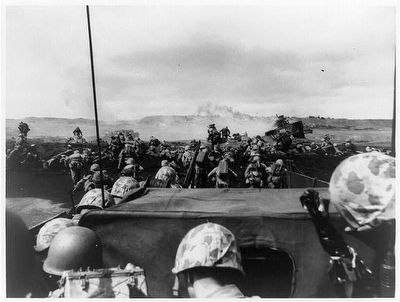 <i>A wave of charging Fourth Division Marines begin an attack...</i> image. Click for full size.
