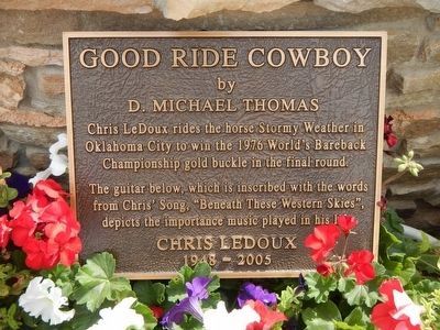 Plaque at the base of "Good Ride Cowboy" Statue image. Click for full size.