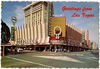 Vintage postcard showing the Horseshoe casino and the "H" Wall image. Click for full size.
