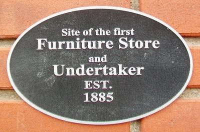 Site of the first Furniture Store and Undertaker Marker image. Click for full size.