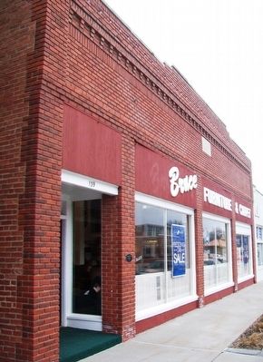 Site of the first Furniture Store and Undertaker Marker image. Click for full size.