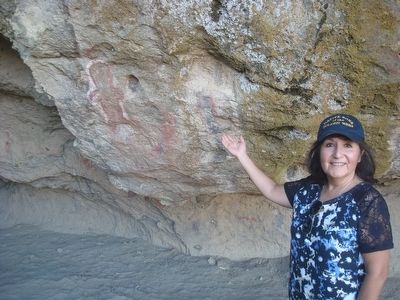Sylvia Alvarado with some of the rock art. Click for full size. Sylvia Alvarado with some of the rock art image. Click for full size.
