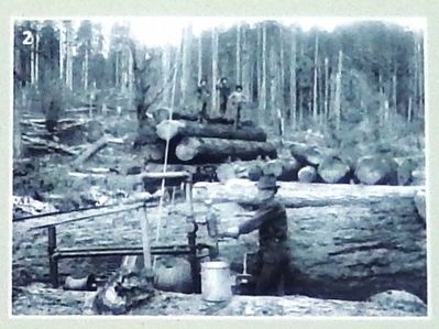 Marker Photo Detail: Loggers cutting and stacking timber image. Click for full size.