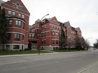 Marker & Our Lady of Victory Homes Building image. Click for full size.