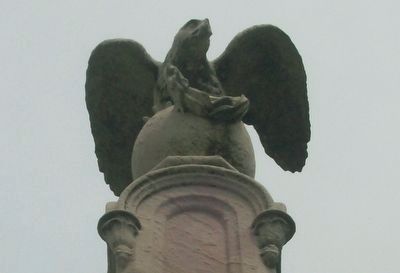 The eagle stands guard over the memory of those who gave 'the last full measure of devotion.'. Click for full size. The eagle stands guard over the memory of those who gave 'the last full measure of devotion.' image. Click for full size.