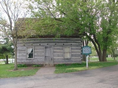 The Log Cabin and Marker at Heritage Park image. Click for more information.