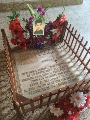 Father Alirio Napolen Macas grave inside of the church image. Click for full size.