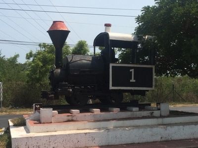 A small train locomotive near the Acajutla marker.. Click for full size. A small train locomotive near the Acajutla marker. image. Click for full size.