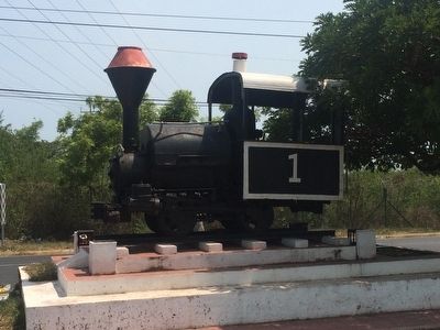 A small train locomotive near the Acajutla marker. image. Click for full size.