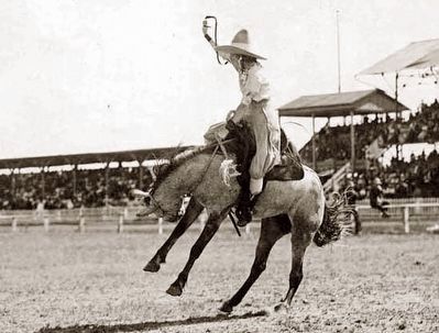 Prairie Rose Henderson competed in saddle bronc riding in the Cowgirl competition image. Click for full size.