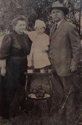 George W. Boyle and wife, Lydia and their first grandchild, William George in 1913. image. Click for full size.