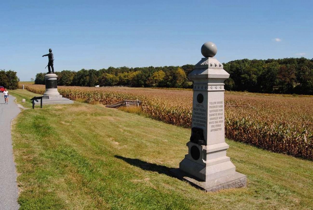 147th New York Infantry Monument<br>Looking North Along Reynolds Avenue. Click for full size. 147th New York Infantry Monument<br>Looking North Along Reynolds Avenue image. Click for full size.