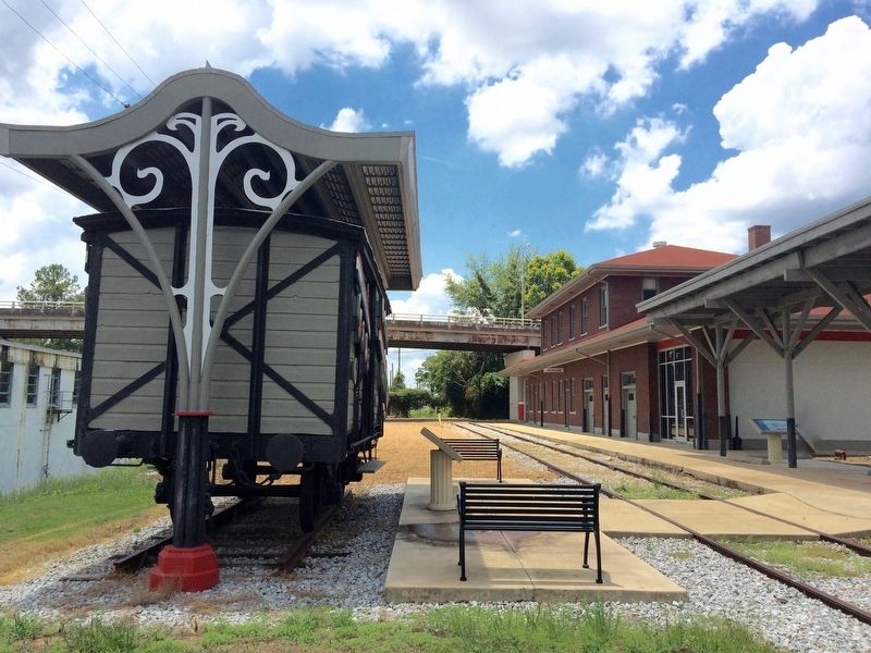 Merci Train Boxcar (side view & view of old train depot) image. Click for full size.