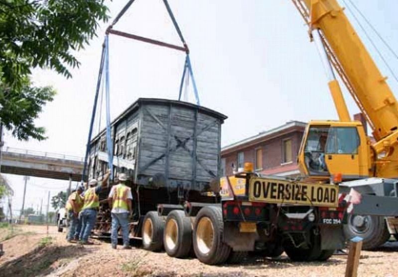 Merci Train Boxcar being placed at final location next to GM&O Depot.. Click for full size. Merci Train Boxcar being placed at final location next to GM&O Depot. image. Click for full size.