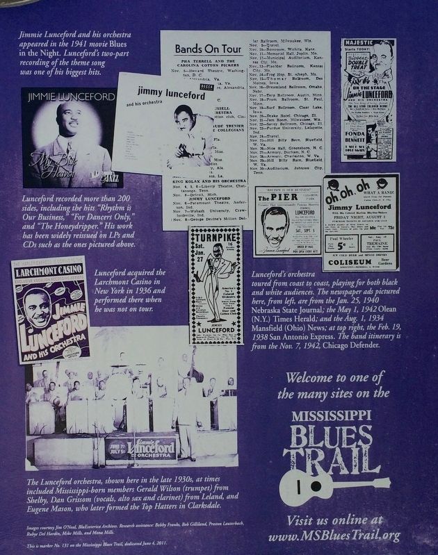 Closeup of photos on rear of marker. image. Click for full size.