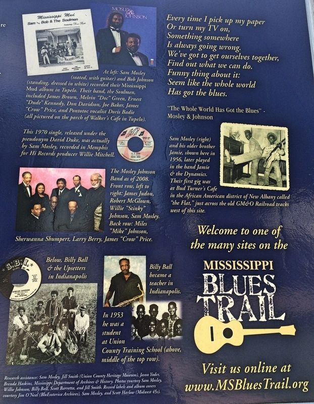 Closeup of photos on rear of marker.. Click for full size. Closeup of photos on rear of marker. image. Click for full size.