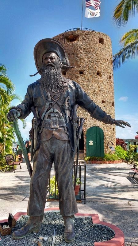 Statue of Blackbeard with Blackbeard's Castle in background image. Click for full size.