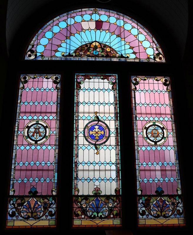 One of the three large stained glass windows image. Click for full size.