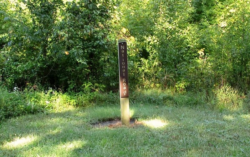 Marker post denoting where the National Road crossed the Miami- Erie Canal image. Click for full size.