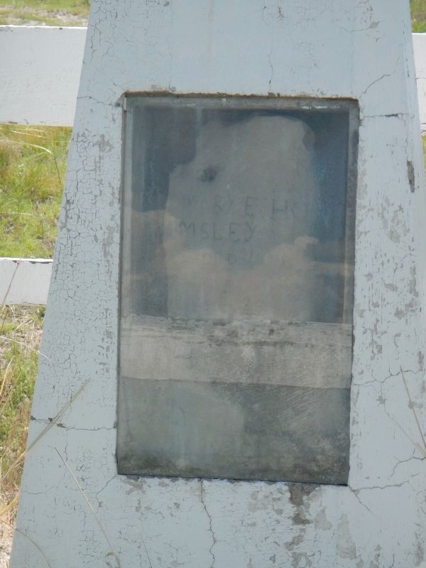 The original headstone enclosed in the 1926 monument. image. Click for full size.