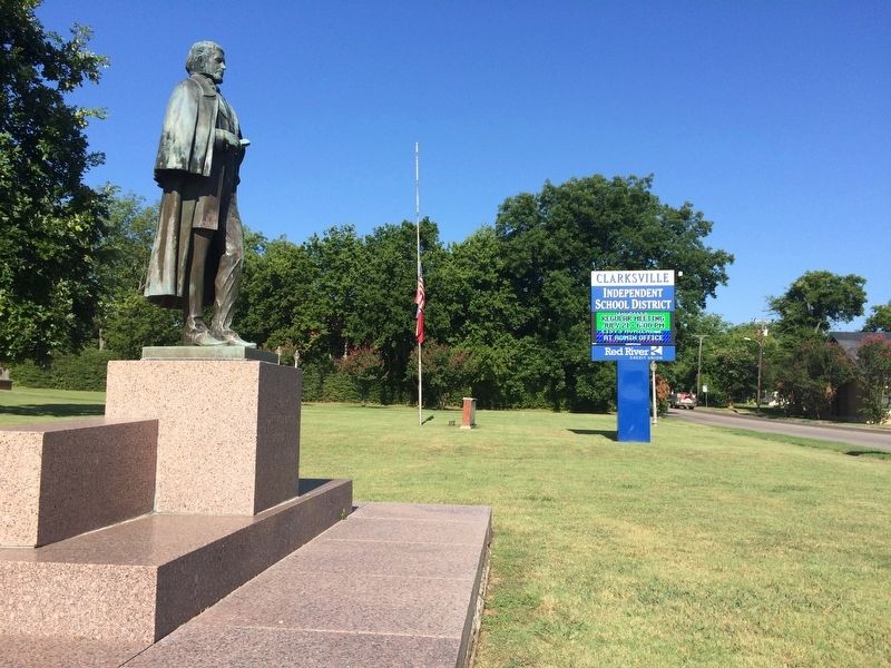 David Gouverneur Burnet statue and Clarksville High School sign. image. Click for full size.