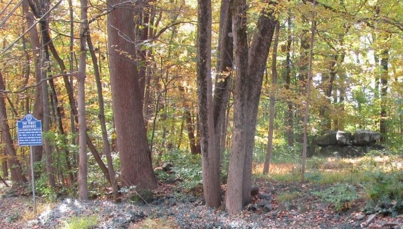 The Three Brothers Marker - Rock formation in the distance. Click for full size. The Three Brothers Marker - Rock formation in the distance image. Click for full size.