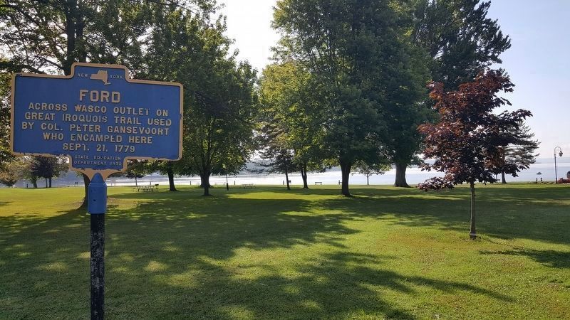 Ford Across Wasco Outlet marker within Emerson Park. Owasco Lake is in background.. Click for full size. Ford Across Wasco Outlet marker within Emerson Park. Owasco Lake is in background. image. Click for full size.