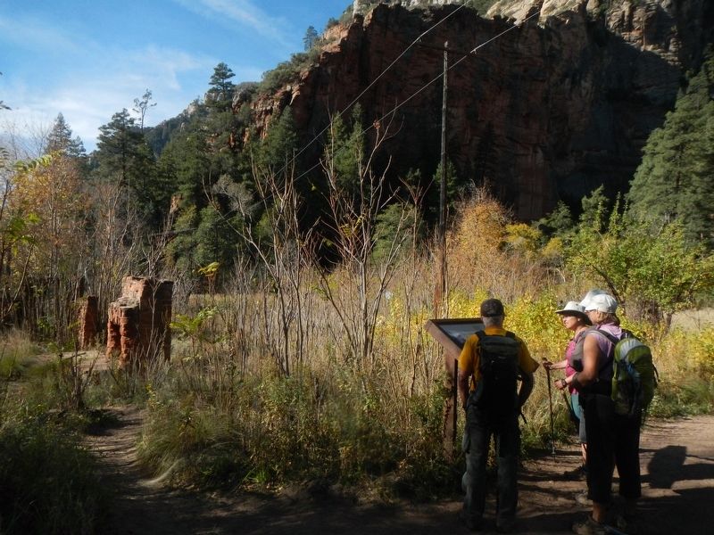 A Canyon Retreat: Mayhew Lodge Marker with the foundation of the Mayhew Lodge in the background. Click for full size. A Canyon Retreat: Mayhew Lodge Marker with the foundation of the Mayhew Lodge in the background image. Click for full size.