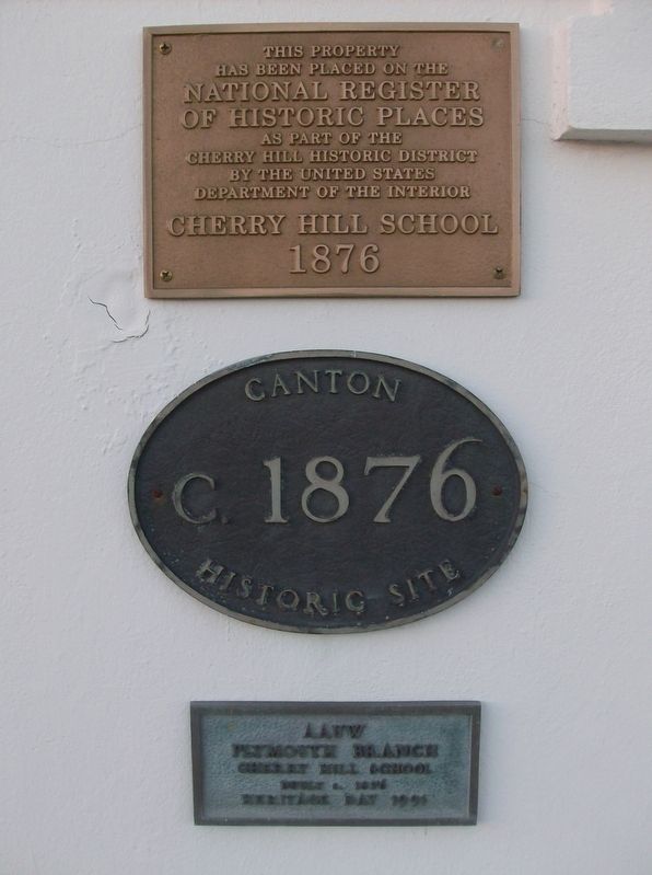Plaques at the left of the main door image. Click for full size.