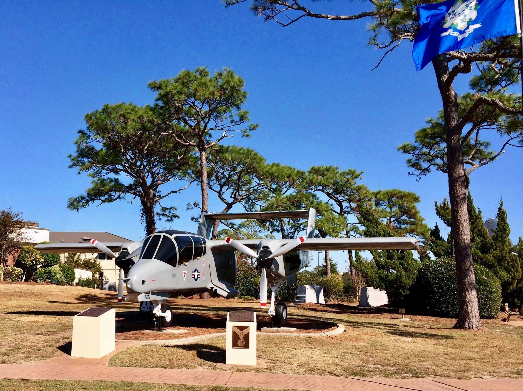 OV-10 Bronco with Captain Steven Bennett Medal of Honor memorial.. Click for full size. OV-10 Bronco with Captain Steven Bennett Medal of Honor memorial. image. Click for full size.