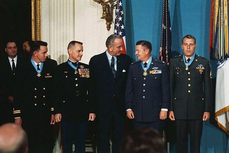 President Johnson congratulates Medal of Honor recipients. image. Click for full size.