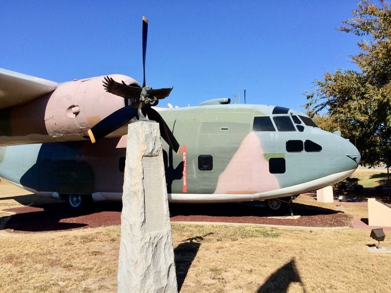 C-123 Provider aircraft (Ranch Hand Memorial in foreground).. Click for full size. C-123 Provider aircraft (Ranch Hand Memorial in foreground). image. Click for full size.