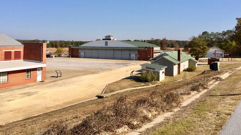 Shed is located on extreme right behind green electrical transformer. image. Click for full size.