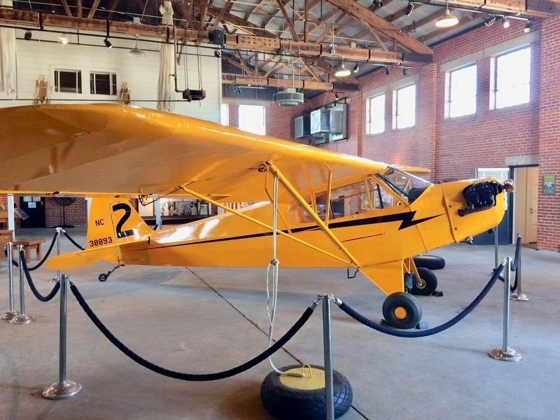 Piper J-3 "Cub' airplane used in the training of the Tuskegee Airmen. image. Click for full size.