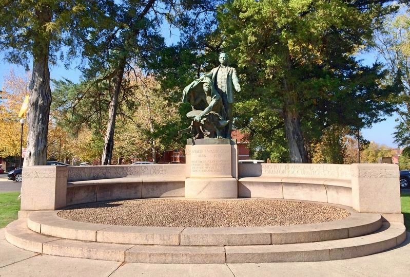 Booker T. Washington - 'Lifting the Veil of Ignorance' statue.. Click for full size. Booker T. Washington - 'Lifting the Veil of Ignorance' statue. image. Click for full size.