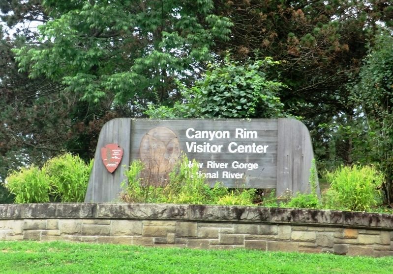 Sign at the entrance to the Canyon Rim Visitor Center for the New River Gorge National River. Click for full size. Sign at the entrance to the Canyon Rim Visitor Center for the New River Gorge National River image. Click for full size.
