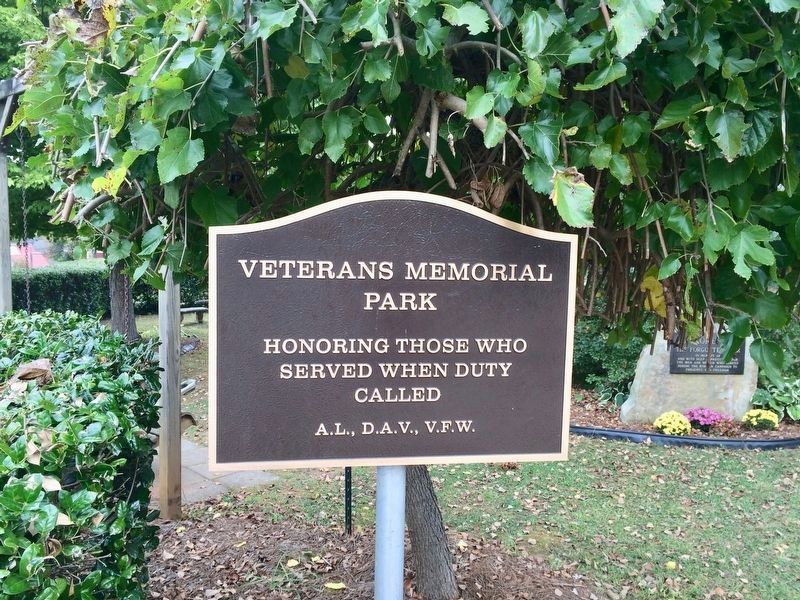 Veterans Memorial Park with plaque in background, on right. image. Click for full size.